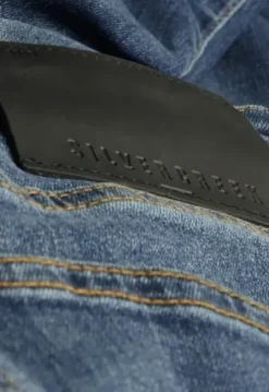 Porter Slim Tapered Jeans